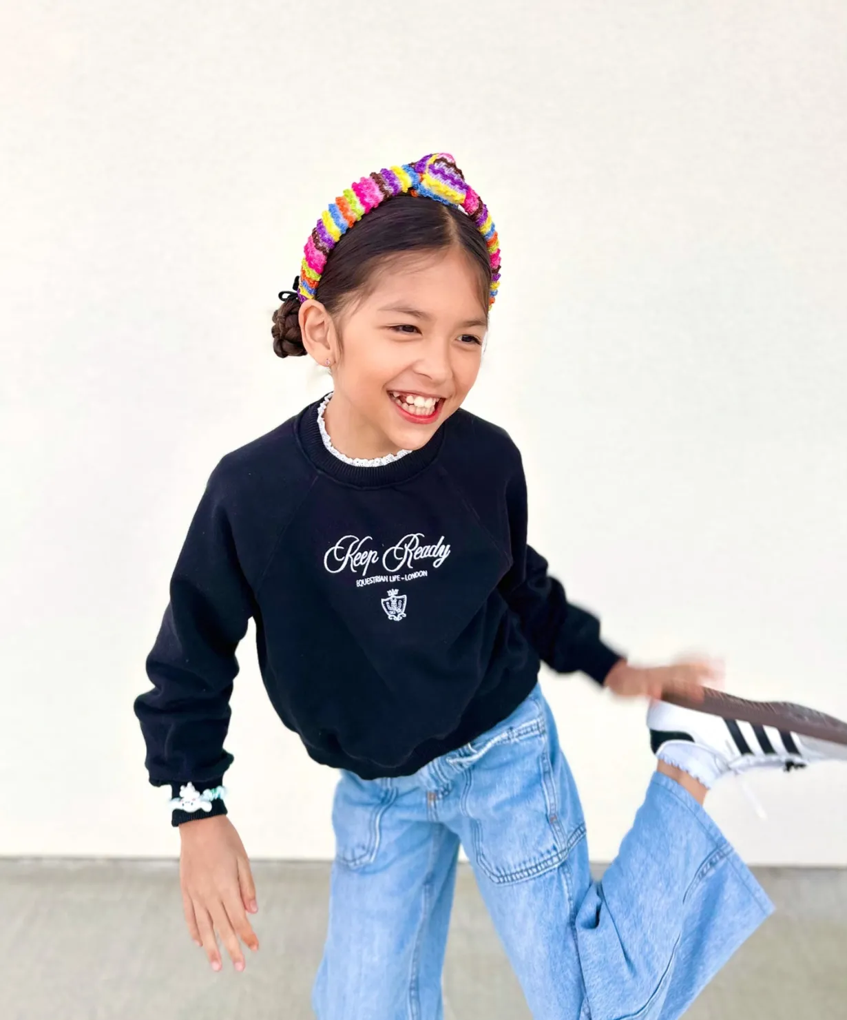 child_size_fiesta_rainbow_1.webp Child Size Fiesta Rainbow Ruffle Headband-Brianna Cannon New