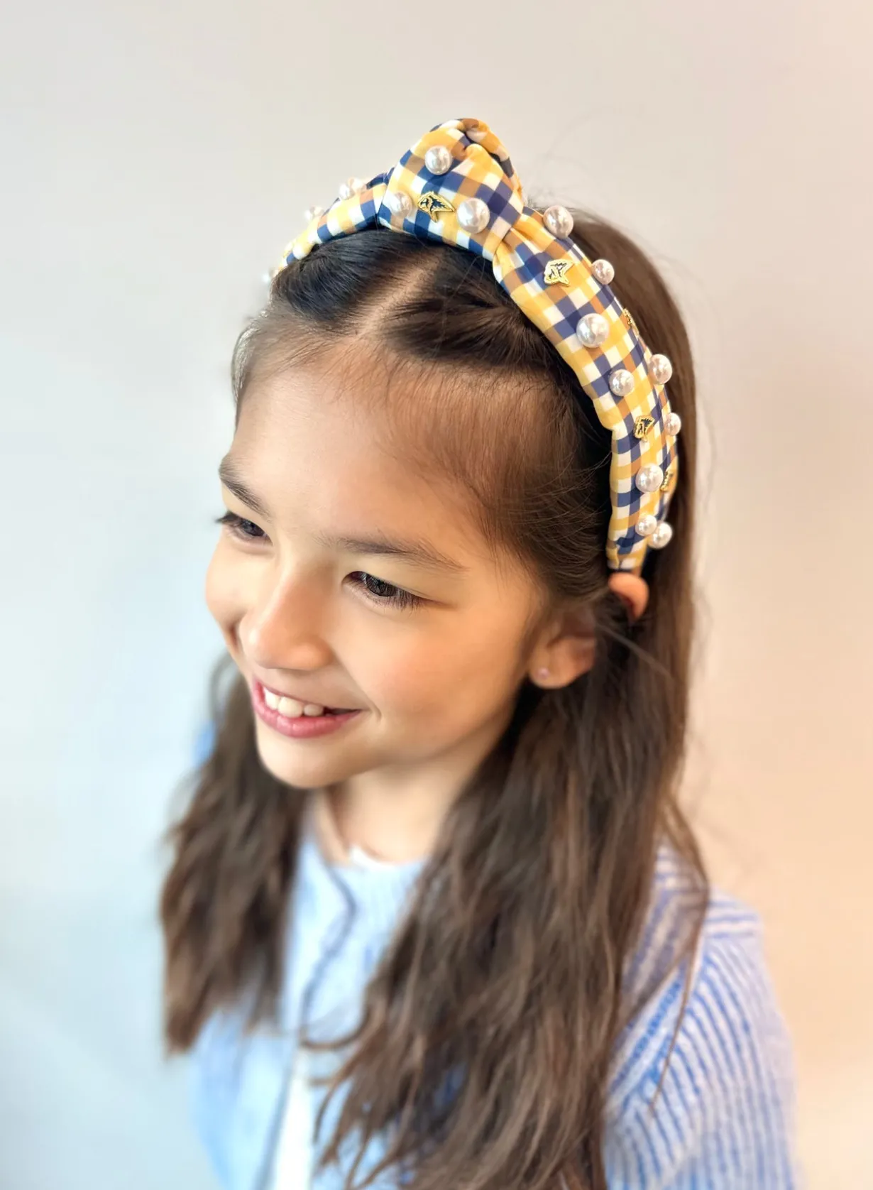 child_size_gold__navy_gin_1.webp Child Size Gold & Navy Gingham PCA Logo Headband With Pearls-Brianna Cannon Sale