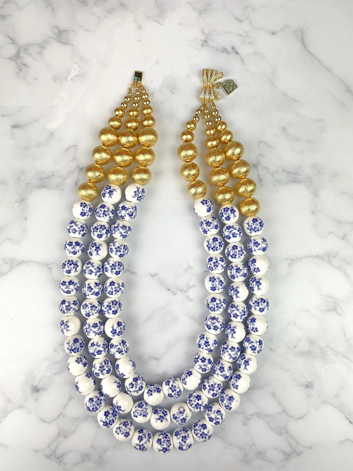 strand_blue_and_white_fl_4.webp 3 Strand Blue and White Floral Beaded Brianna Necklace-Brianna Cannon Fashion