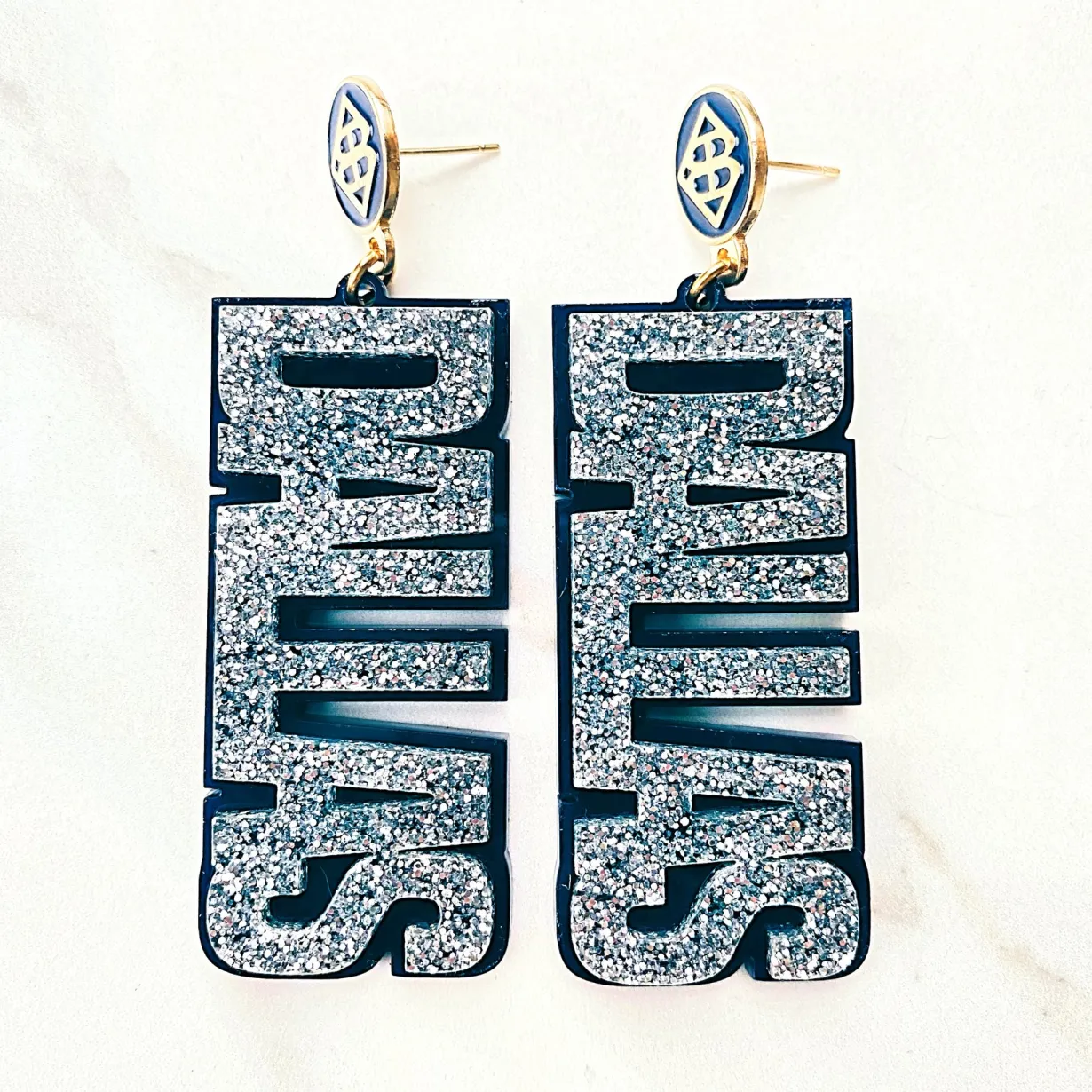 team_colors__silver_glitt_0.webp Team Colors - Silver Glitter DALLAS Earrings over Navy with Navy BC Logo Top-Brianna Cannon Fashion