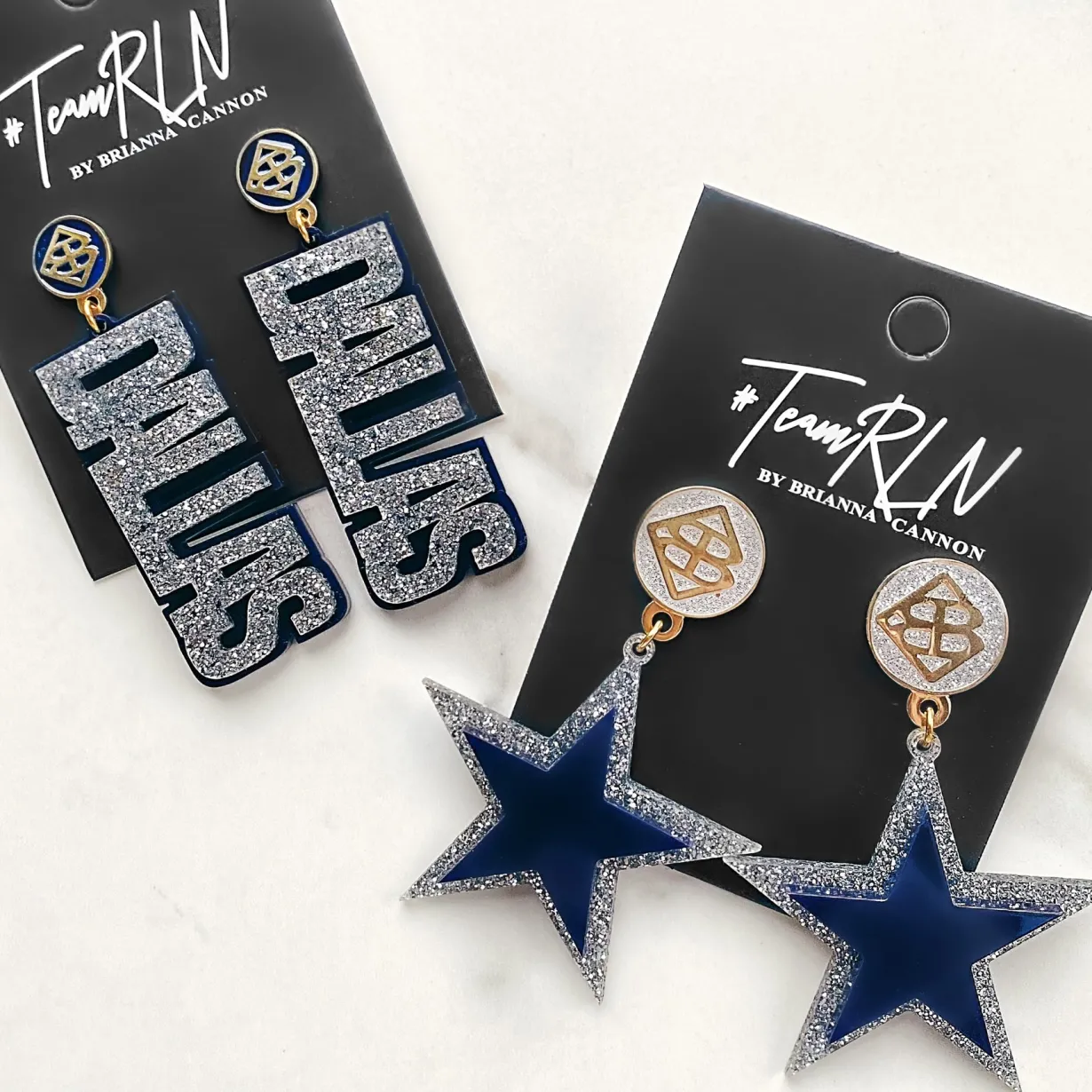 team_colors__silver_glitt_1.webp Team Colors - Silver Glitter DALLAS Earrings over Navy with Navy BC Logo Top-Brianna Cannon Fashion