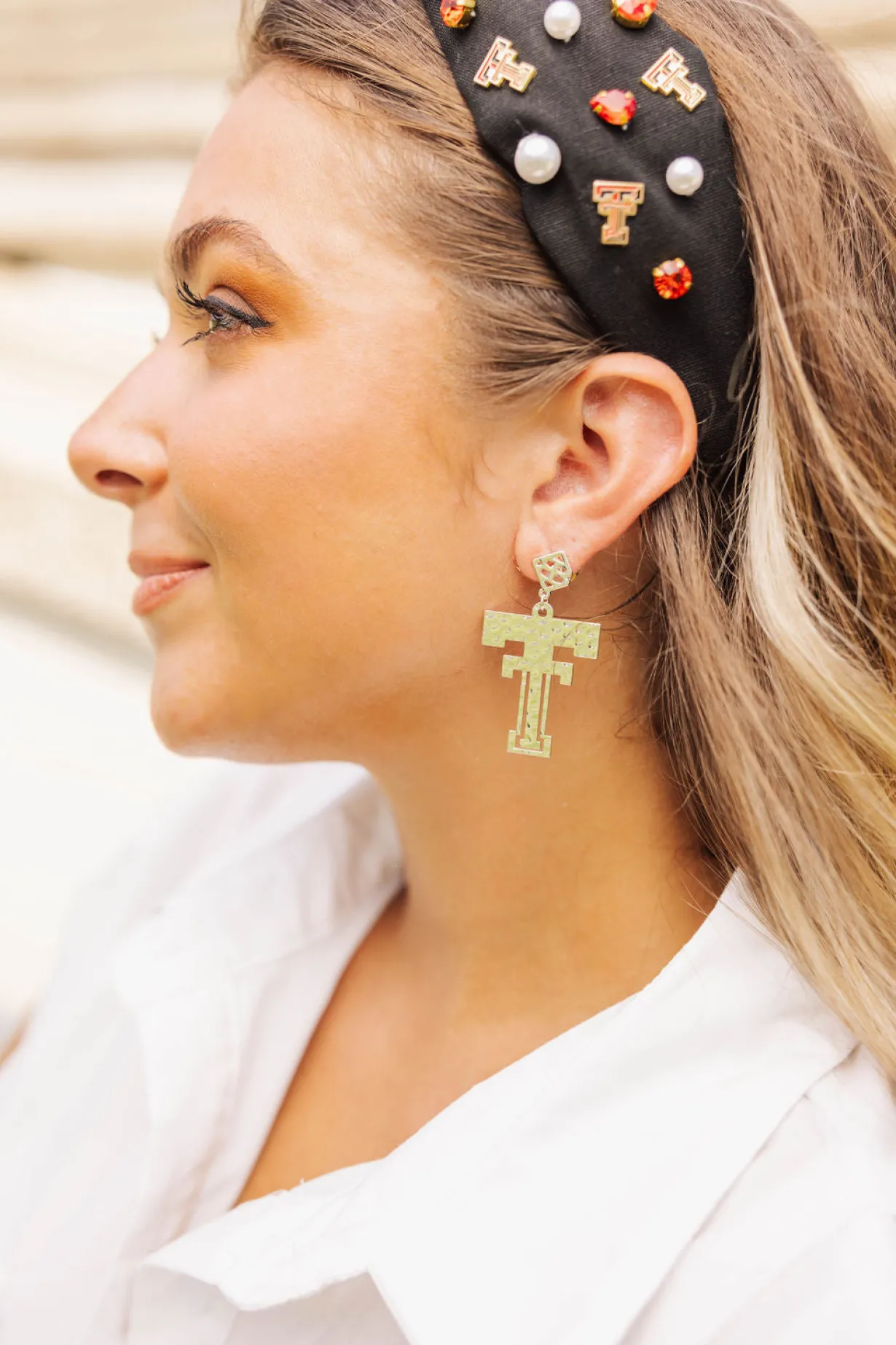 texas_tech_gold_logo_earr_3.webp Texas Tech Gold Logo Earring with BC Logo-Brianna Cannon Sale